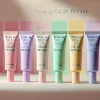 A close-up of five different 'Ririmew Tone Up Color Primer' tubes arranged horizontally. The colors range from soft pink to vibrant lavender, green, yellow, and blue, representing the different shades available in the product line. The background is simple, with a light gradient that complements the tones of the makeup primers, highlighting the product’s diverse color range.